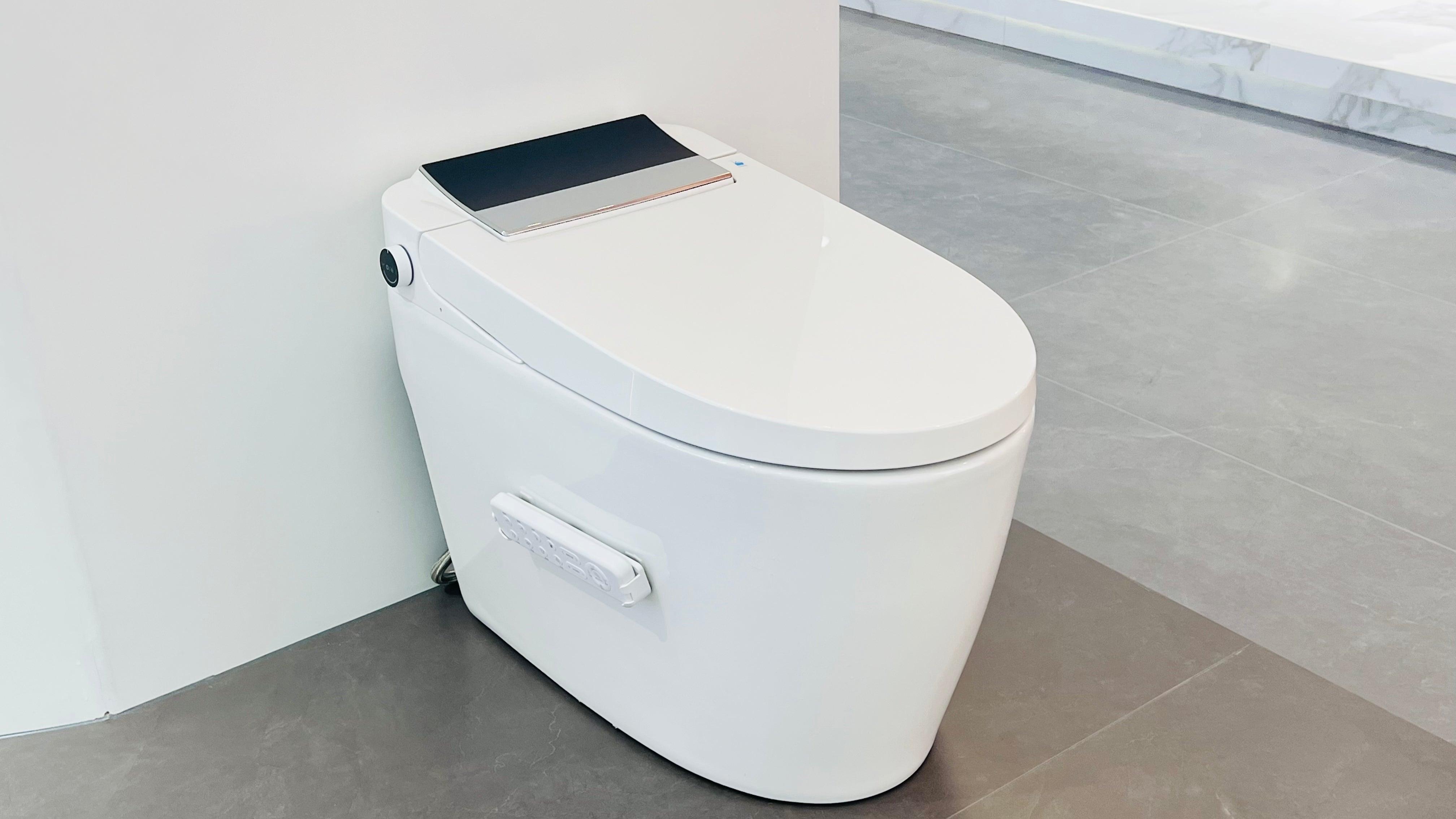 Can a P-Trap smart toilet be installed flush against the wall